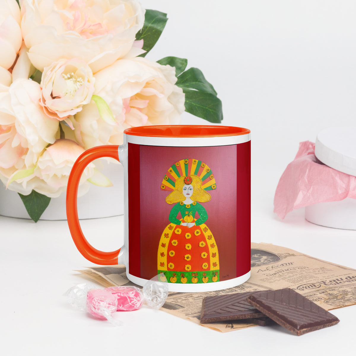 Autumn Pumpkin Princess ceramic mug by Dexi M. with orange handle and interior, showing colorful princess artwork.